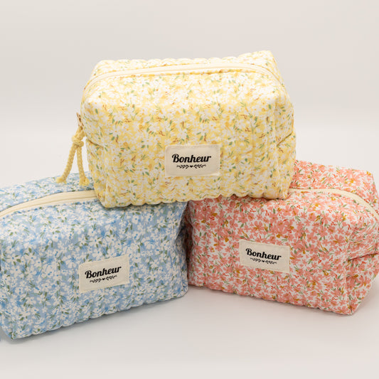 Gele toilettas met bloemetjes