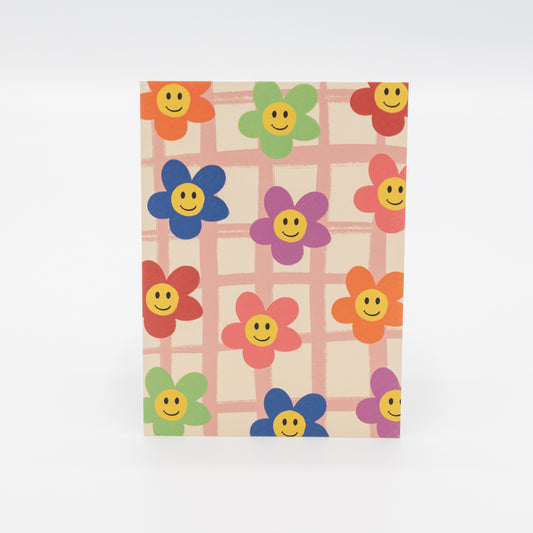 Wenskaart met smiley-bloemen