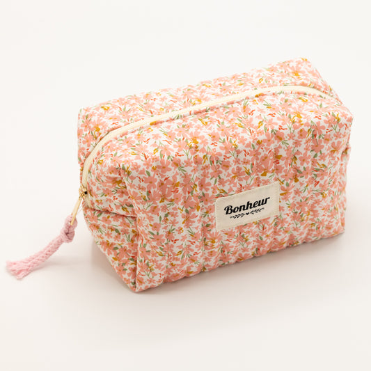 Roze toilettas met bloemetjes