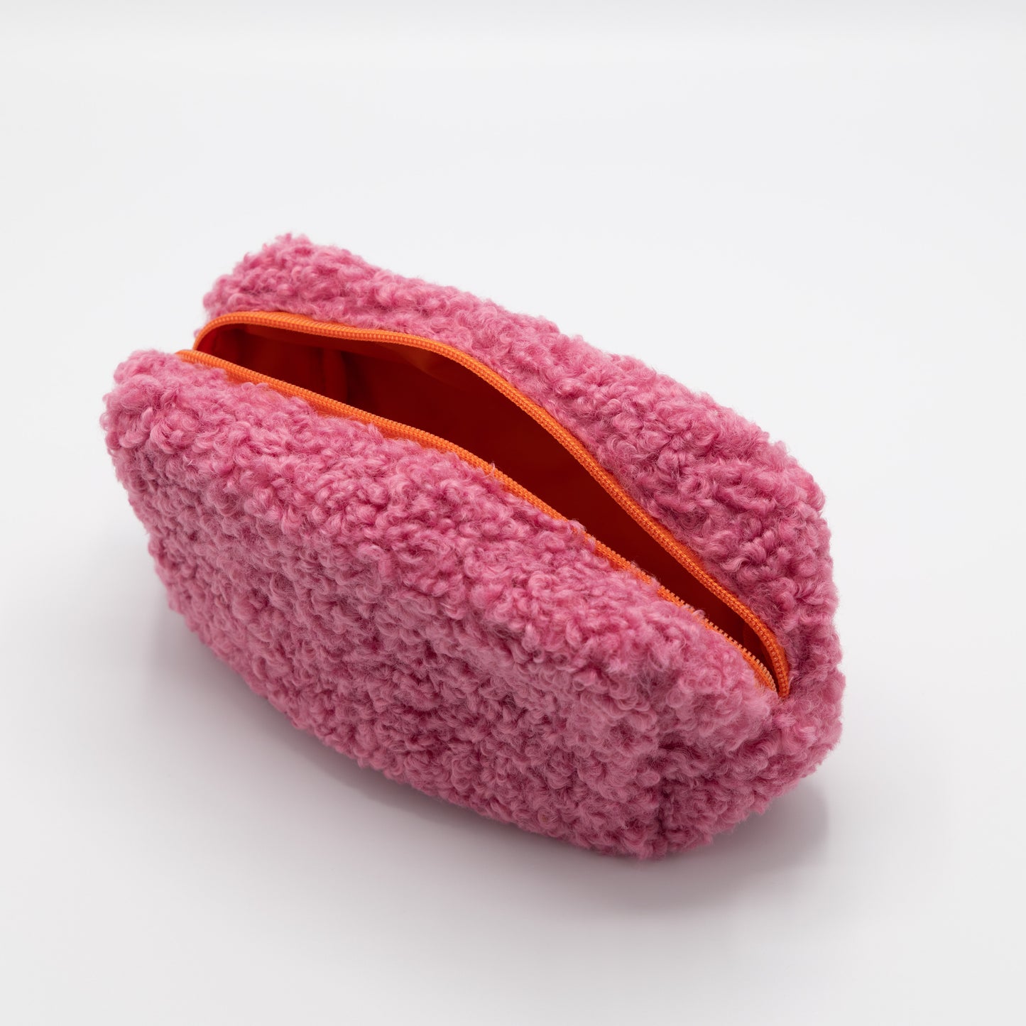 Fluffy toiletzak met oranje rits